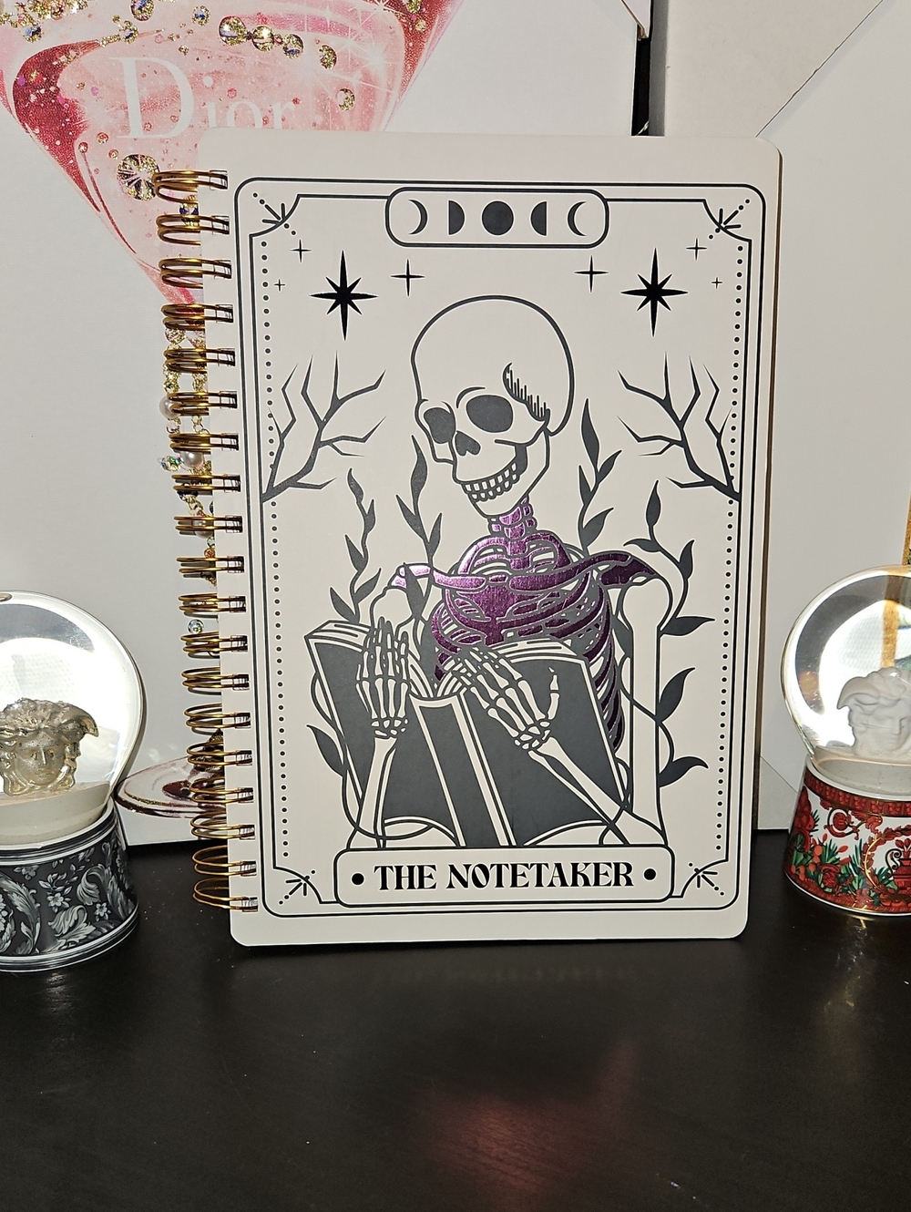 The Notetaker Spiral Notebook – White with Black & Purple Skeleton Design